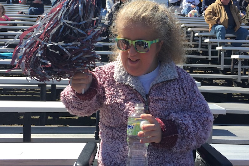 Jillian, who has WDR19 cheers at a game