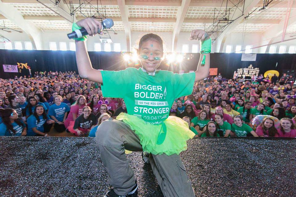 boy with esophageal damage dances on stage