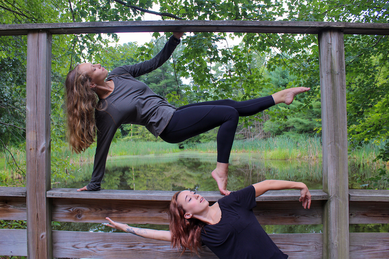 Nicole and Alana, who both had PAO surgery to correct their hip dysplasia, dance together in a park.