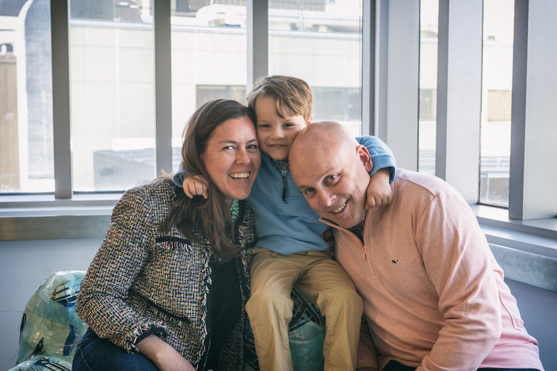 boy with tracheobronchomalacia hugs his parents
