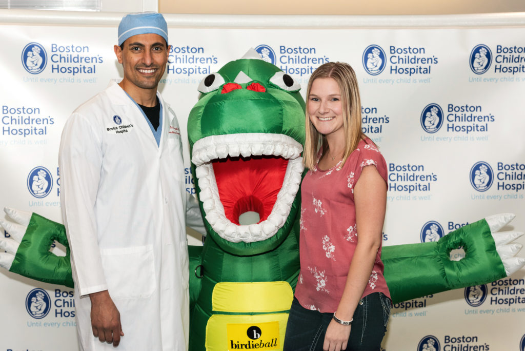 kayla poses with her pain doctor in the patient education center