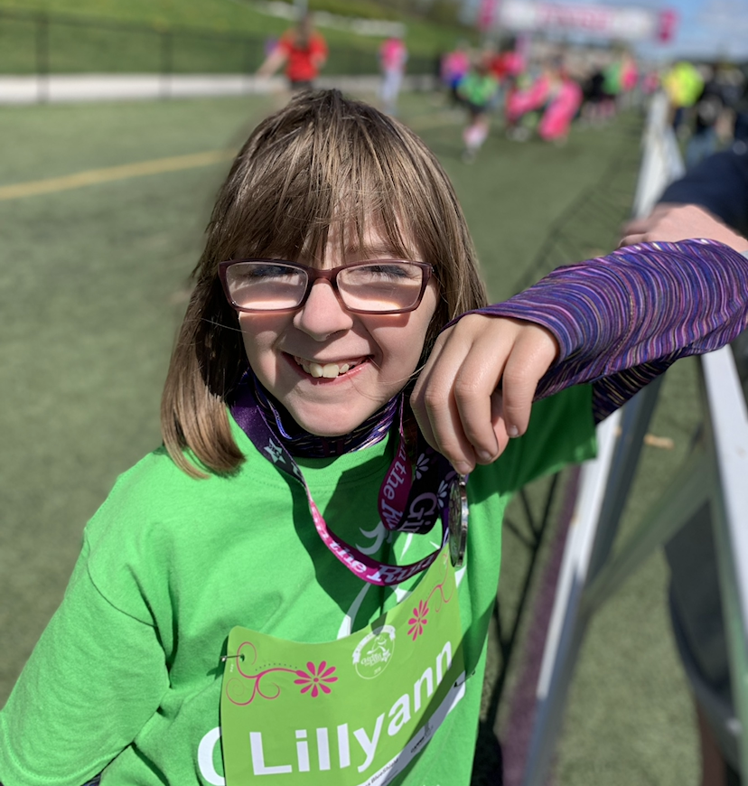 Photo of Lilly Cole with medal