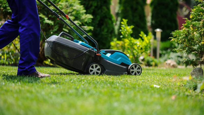 Someone mowing a lawn