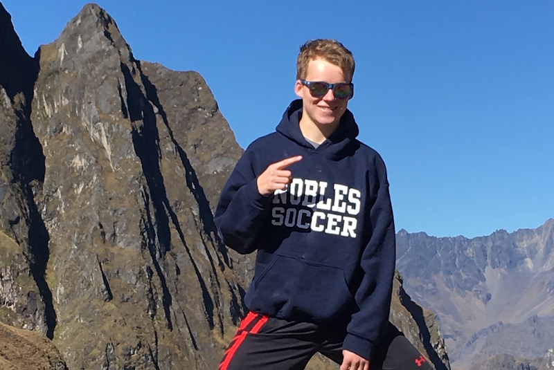 Bryan, who had an AVM, poses on a mountainside