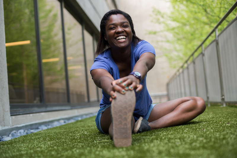 Louise, who had hip dysplasia and femoral acetabular impingement, stretches outside.