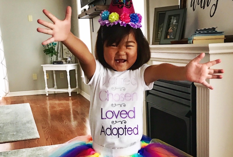 Faith, who has a single ventricle heart defect, poses in her birthday tutu