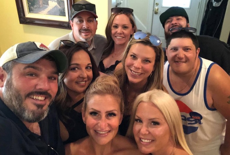 Joey, who is a patient in the BACH Program, at a party with his family