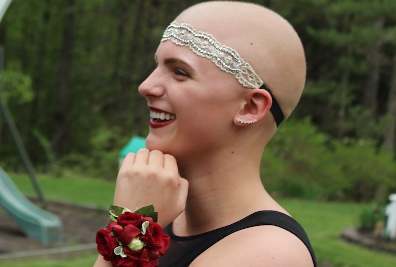 Maddie, who had immunotherapy treatment for cancer, wears a headband and corsage for her Junior Prom.