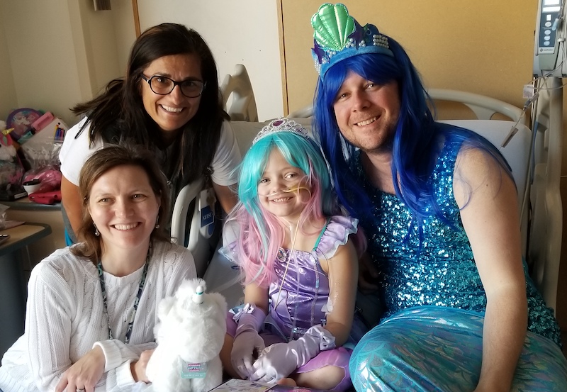 Interstitial lung disease patient Caitlyn with her care team