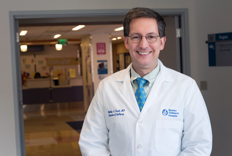 Epilepsy doctor Philip Pearl stands in a hallway in the hospital
