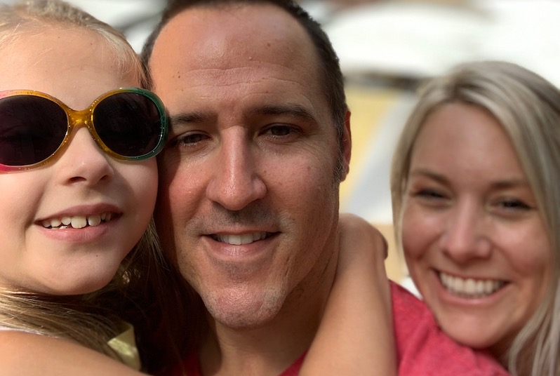 Zeeva, who has a rare type of epilepsy, poses in hospital scrubs with her mom