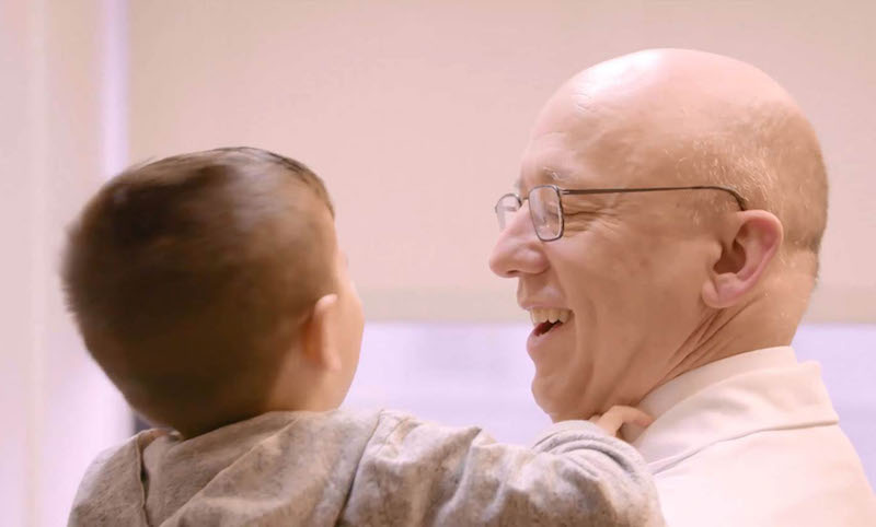Dr. Steve Fishman holds a patient