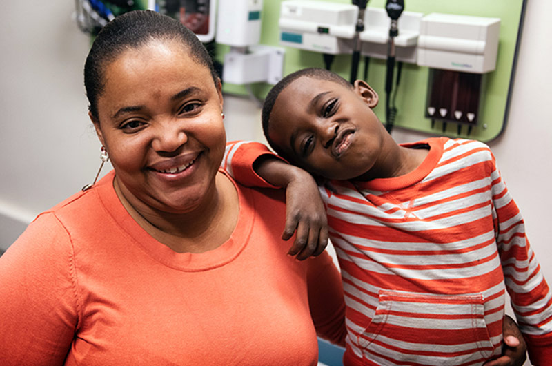 Lamarcus, who has sickle cell, with his mom, Stephanie