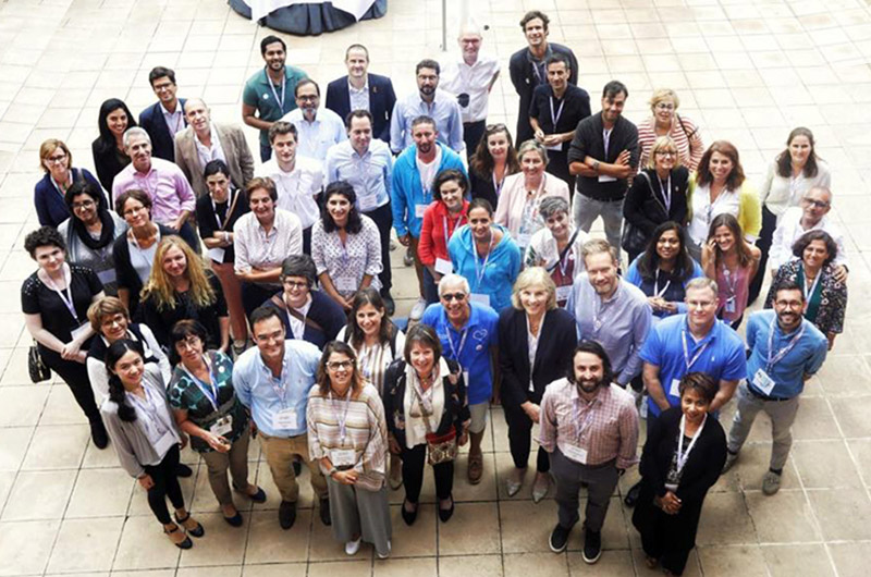 Members of GC Global pose outside during their conference in Barcelona, Spain.