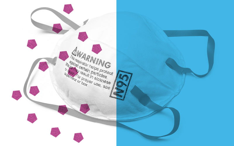 N95 mask with illustrated germs outside of it
