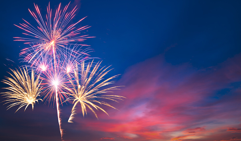 Fireworks going off at dusk