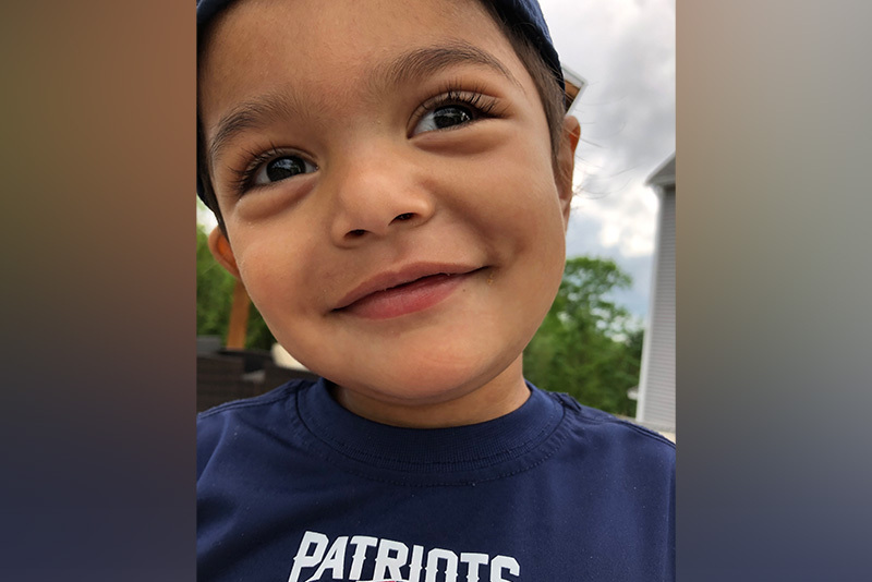 Keith, who has nephrotic syndrome, wearing a New England Patriots shirt