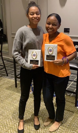Gricelda and Gwen, who has asthma, pose with their trophies.
