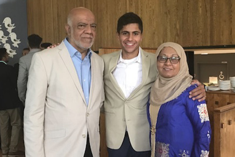 Maythym, who has midoaortic syndrome, poses with relatives.