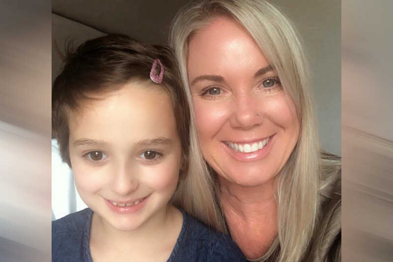 Emma and her mom Lynda after treatment for Emma's epilepsy