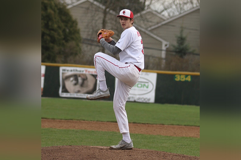 Micheal, who had osteosarcoma, playing baseball.
