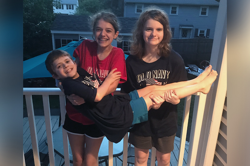 Carter, who had an imperforate anus, hangs out with his family